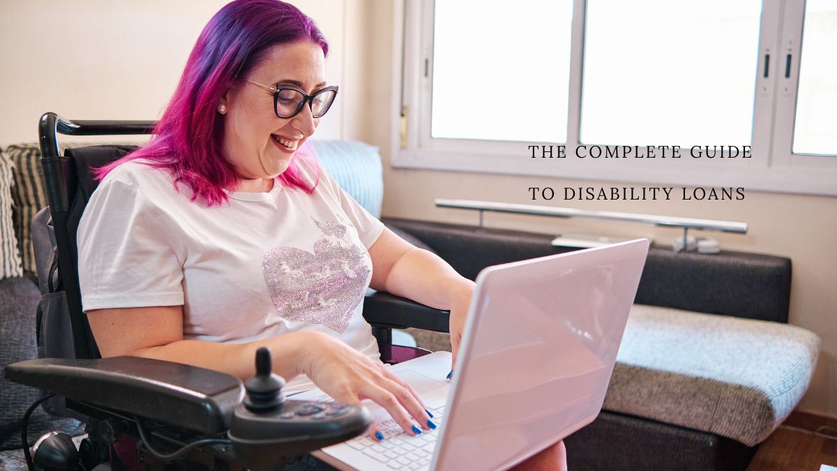 a women looking disability benefits loans by laptop in the Image